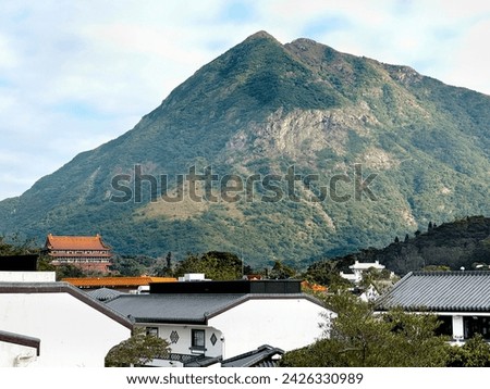Breathtaking view of Ngong Ping highlands in Hong Kong. Seen is the mountain and hills,Picture is taken from the Giant Buddha or Tian Tian Buddha monastery. Gives a fresh jungle and country side feel.