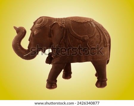 elephant statue isolated on yellow background