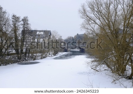 Frozen river Lahn in Marburg, Germany Royalty-Free Stock Photo #2426345223