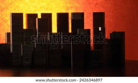 Stapler Pin arts,buildings with fire background