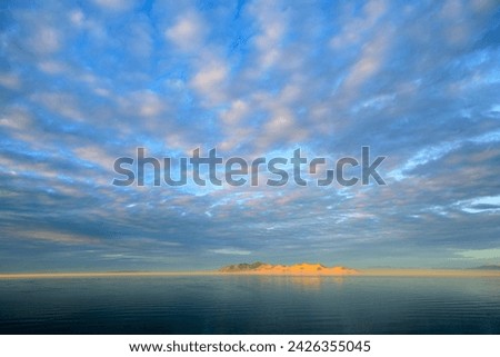 Above the Clouds: Blue Sky and White Clouds at Atmosphere Level (4K Ultra HD) Royalty-Free Stock Photo #2426355045