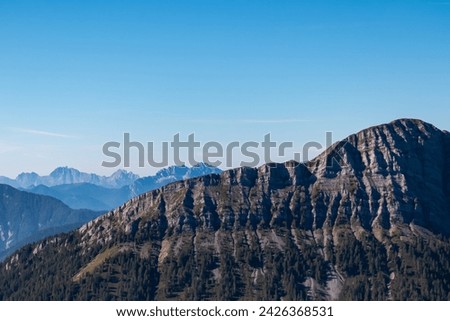 Panoramic view of rugged mountain peak Staff seen from Goldeck, Latschur group, Gailtal Alps, Carintha, Austria. Distant view of majestic Julian Alps. Scenic hiking trail in Austrian Alps in summer Royalty-Free Stock Photo #2426368531
