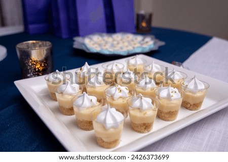 Mini lemon meringue tarts filled with lemon curd, one bite desserts