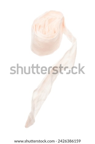 String rope obi Japanese Traditional Komono equipment fly in air with curve. String rope obi Japanese Traditional Komono fabric is beautiful clothes for ceremony event. White background isolated Royalty-Free Stock Photo #2426386159