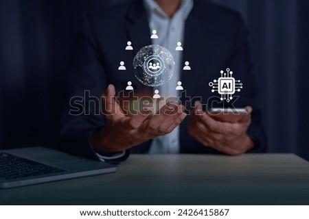 Businessman holding hologram Chat  virtual icon on smartphone intelligence Ai, Chat bot Chat with AI Artificial Intelligence, Futuristic technology, Data exchanges development. 