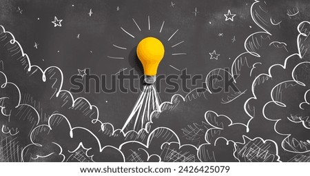 Idea light bulb flying to the sky like a rocket - Flat lay