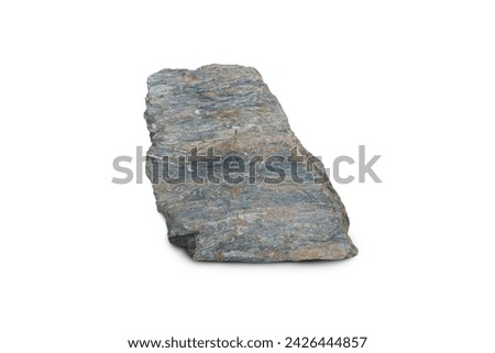 Raw specimen of Mica Schist metamorphic rock stone isolated on white background. Royalty-Free Stock Photo #2426444857