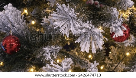 Decorations on the Christmas tree. The concept of winter holidays
