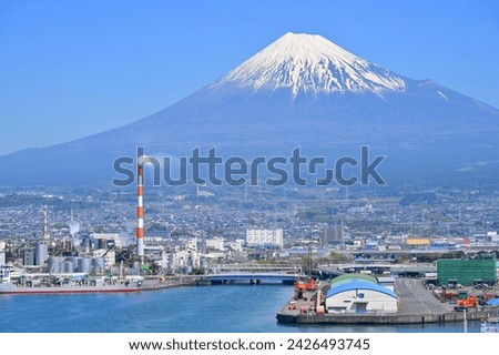 Fuji Mountain and Fisherman boats with Japan industry factory area background view from Tagonoura Fisheries Cooperative cafeteria, Fuji City, Shizuoka prefecture, Japan Royalty-Free Stock Photo #2426493745