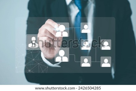 Business management organization in the company A relationship of command or subordination between members. Business process and workflow automation with flowcharts on the virtual screen Royalty-Free Stock Photo #2426504285