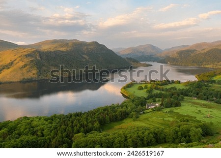 Aerial view of a Summer afternoon at Ullswater seen from Gowbarrow Fell in The Lake District, UK.  Royalty-Free Stock Photo #2426519167