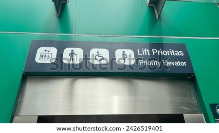 sign system for elevator priority