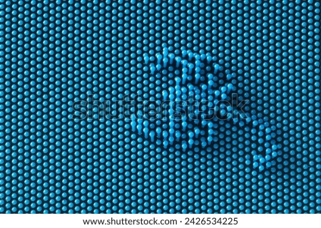 A mosaic of many blue spherical pieces arranged in the shape of a scorpion. Symbolic and abstract background or backdrop. Photo. Close-up