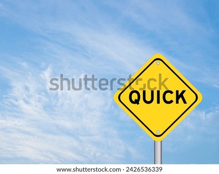 Yellow transportation sign with word quick on blue color sky background