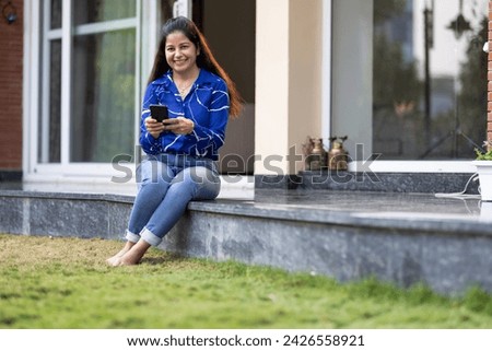 Beautiful woman using mobile phone