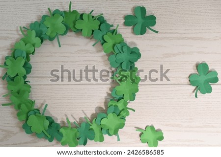 Saint Patrick Day concept. Clover leaves wreath, paper craft.