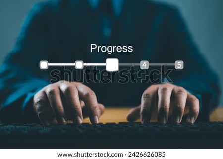Businessman using computer keyboard to update status in checklist to remind work task progressive for project develop management and tracking concept. Royalty-Free Stock Photo #2426626085