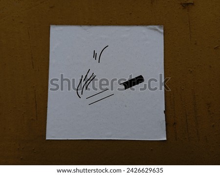 No smoking sign with missing prohibition strip. A cigarette is drawn on paper in black.