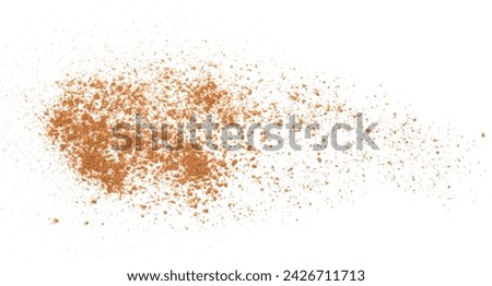 Dry aromatic cinnamon powder isolated on white, top view Royalty-Free Stock Photo #2426711713