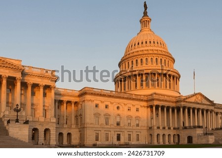 The Capitol Building bathed in the gentle light of sunrise,
View of US capitol Building in Washington DC