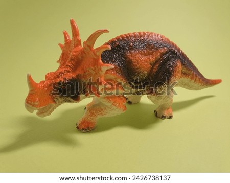 A dinosaur figure I bought at a stationery store with my family.
