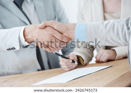 Handshake, business people and collaboration, onboarding with human resources in meeting or interview. Contract, cooperation and partnership with signature, recruitment and shaking hands for welcome