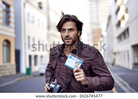 Photographer, journalist and news with man in city for running, press badge and paparazzi. Reporter, story and pictures with person and camera in urban outdoors for announcement and investigation