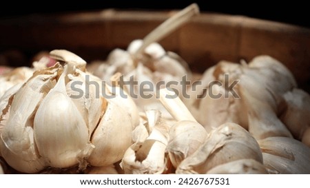 A beautiful picture of garlic. Shine white.