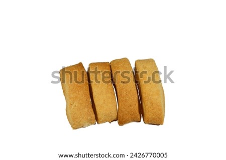 Plain Menen bakery, oriental crackers and cookies, usually baked plain or stuffed with tamr, Ajwa or dates, Arabic Egyptian oriental cuisine of cookies, consumed as a snack with a drink like tea Royalty-Free Stock Photo #2426770005