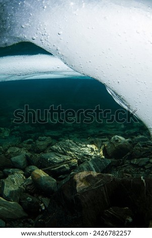 Underwater view of ocean and ice