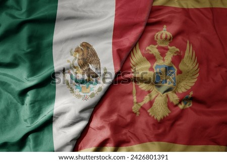 big waving national colorful flag of montenegro and national flag of mexico . macro