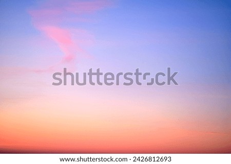 Clear transparent cirrus clouds on a red sunset sky, time lapse