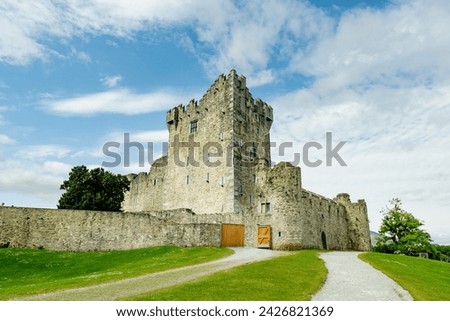 Aerial view of Ross Castle, 15th-century tower house and keep on the edge of Lough Leane, in Killarney National Park, County Kerry, Ireland. Royalty-Free Stock Photo #2426821369