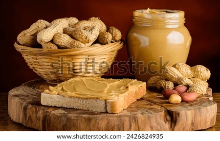 National Peanut Butter Valentine's Day. Peanut butter in a bowl on the table, important date March 1. Peanut butter with bread. Peanut butter with apples, breakfast