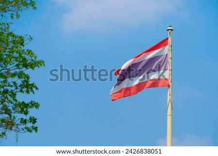 The national flag of Thailand consists of 3 colors. Red represents the nation. White means religion Blue means the king.