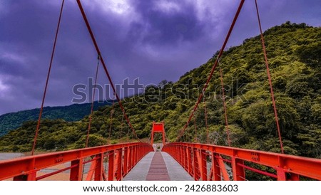 Suspension bridge row wire scenic sky view and mountain scenery before the storm,Jinlun,Taiwan.for branding,calender,postcard,screensave,wallpaper,poster,banner,cover,website.High quality photography
