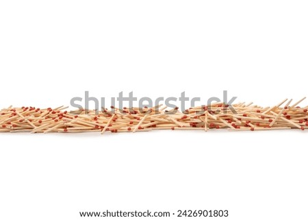 New matchsticks isolated on a background. Top view.  Royalty-Free Stock Photo #2426901803