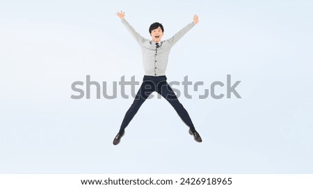 Full body photo of a male student jumping
