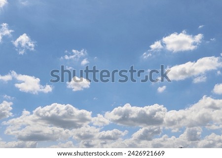 White clouds scattered in the blue sky, bright day, happy day