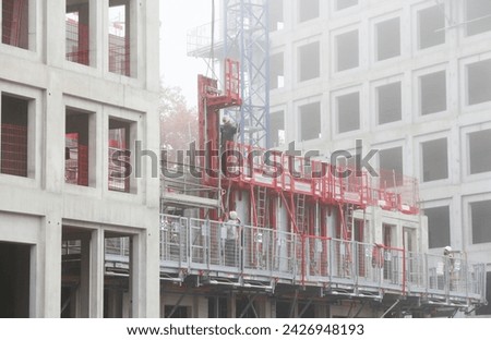 workmen on a big construction site