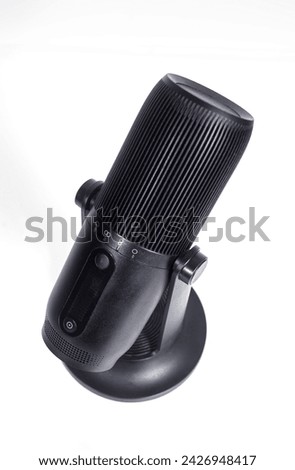 Modern and elegant black design microphone for streaming and gaming isolated  on white background. Technology and entertainment.