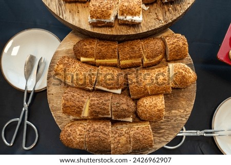 coffee break hotel during conference meeting, corporate revent with tea and coffee catering, decorated catering banquet table with variety of different pastry and bakery, with croissants and cookies Royalty-Free Stock Photo #2426962907