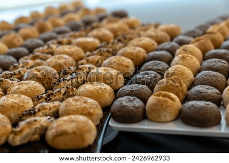 coffee break hotel during conference meeting, corporate revent with tea and coffee catering, decorated catering banquet table with variety of different pastry and bakery, with croissants and cookies Royalty-Free Stock Photo #2426962933