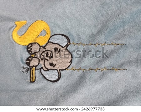 Elephant pic in clothe with yellow color