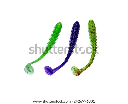 Fishing  baits isolated on a white background. Set of multi-colored silicone baits. Fishing tackle.. Royalty-Free Stock Photo #2426996301