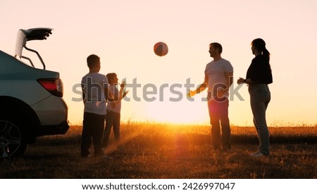 happy family having fun outdoors, travel by car, child kid mother father happy family, day off, vacation teamwork, children picnic, parents daughter son playing ball, weekend trip family car, ball