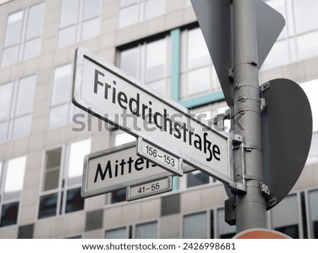 Friedrichstraße in Berlin. Sign with the road name at an intersection. The street is an important part of the infrastructure in the capital city.