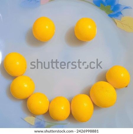 Smiling Lemons. These happy lemons are symbols of unadulterated happiness and boundless enthusiasm for life, not simply fruits.  Every bite or squeeze promises a rush of delicious citrus taste.