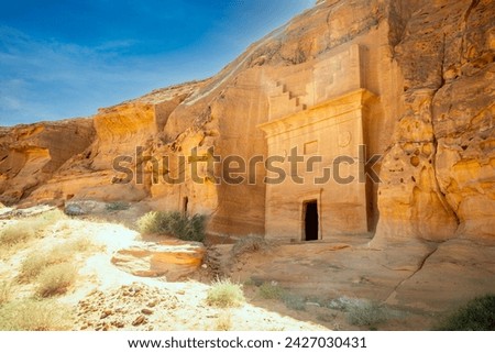 Ancient Nabataean tombs of Jabal al Ahmar carved in stone rock, Madain Saleh, Al Ula, Saudi Arabia Royalty-Free Stock Photo #2427030431
