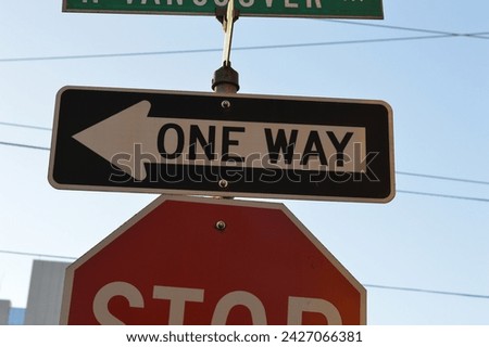 One way street sign on a blue sky background DSLR high resolution photo